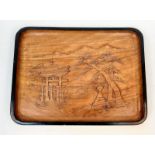 A vintage, Japanese, hand carved tray with the Itsukushima shrine, a UNESCO World Heritage Site.