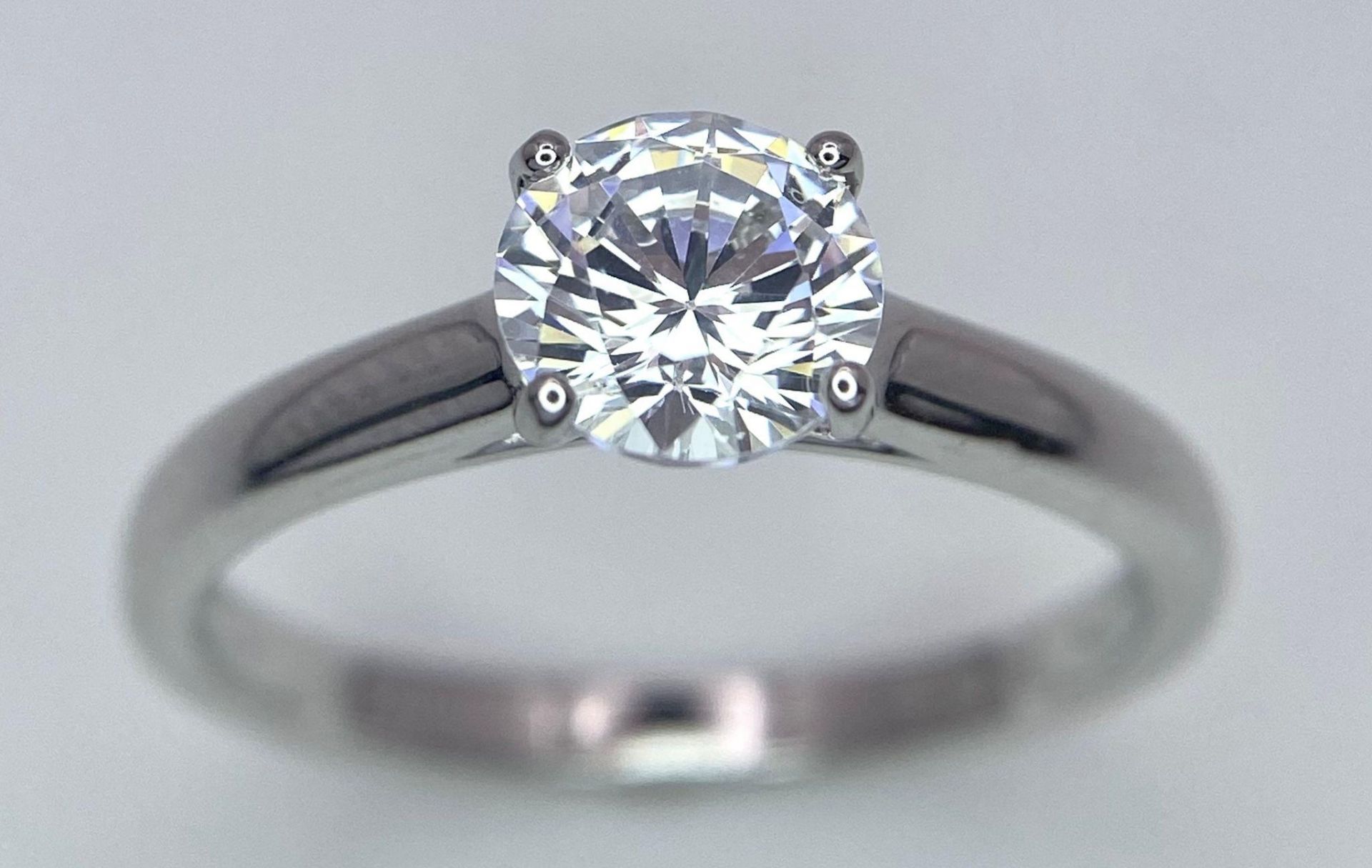 A sterling silver solitaire ring with a round cut cubic zirconium. Size: N, weight: 2 g. - Bild 6 aus 16