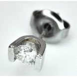 AN 18K WHITE GOLD DIAMOND STUD EARRING. 0.20CT. 0.8G.