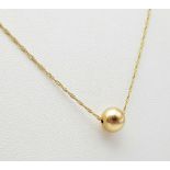 18K Yellow Gold (tested as) Ball Necklace, 2.2g total weight, 20” chain length
