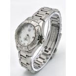 A Tag Heuer Aqua Racer Quartz Ladies Watch. Stainless steel bracelet and case - 28mm. Mother of