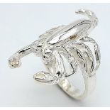 An unusual sterling silver scorpion ring, size: L, weight: 6.8 g.