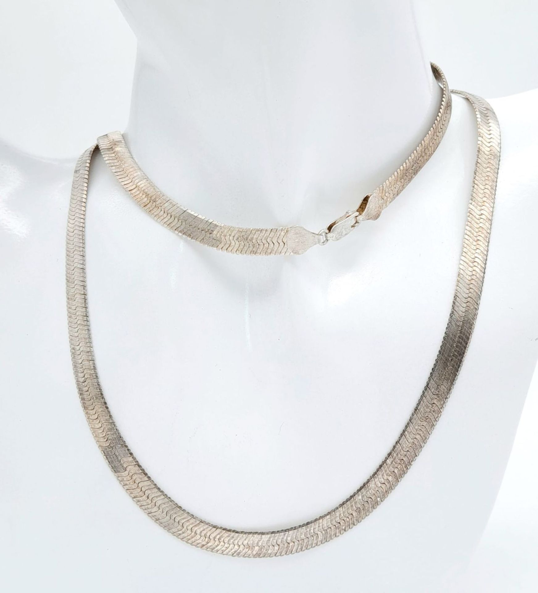 A Vintage Long 925 Silver Herringbone Necklace. 74cm. 34g