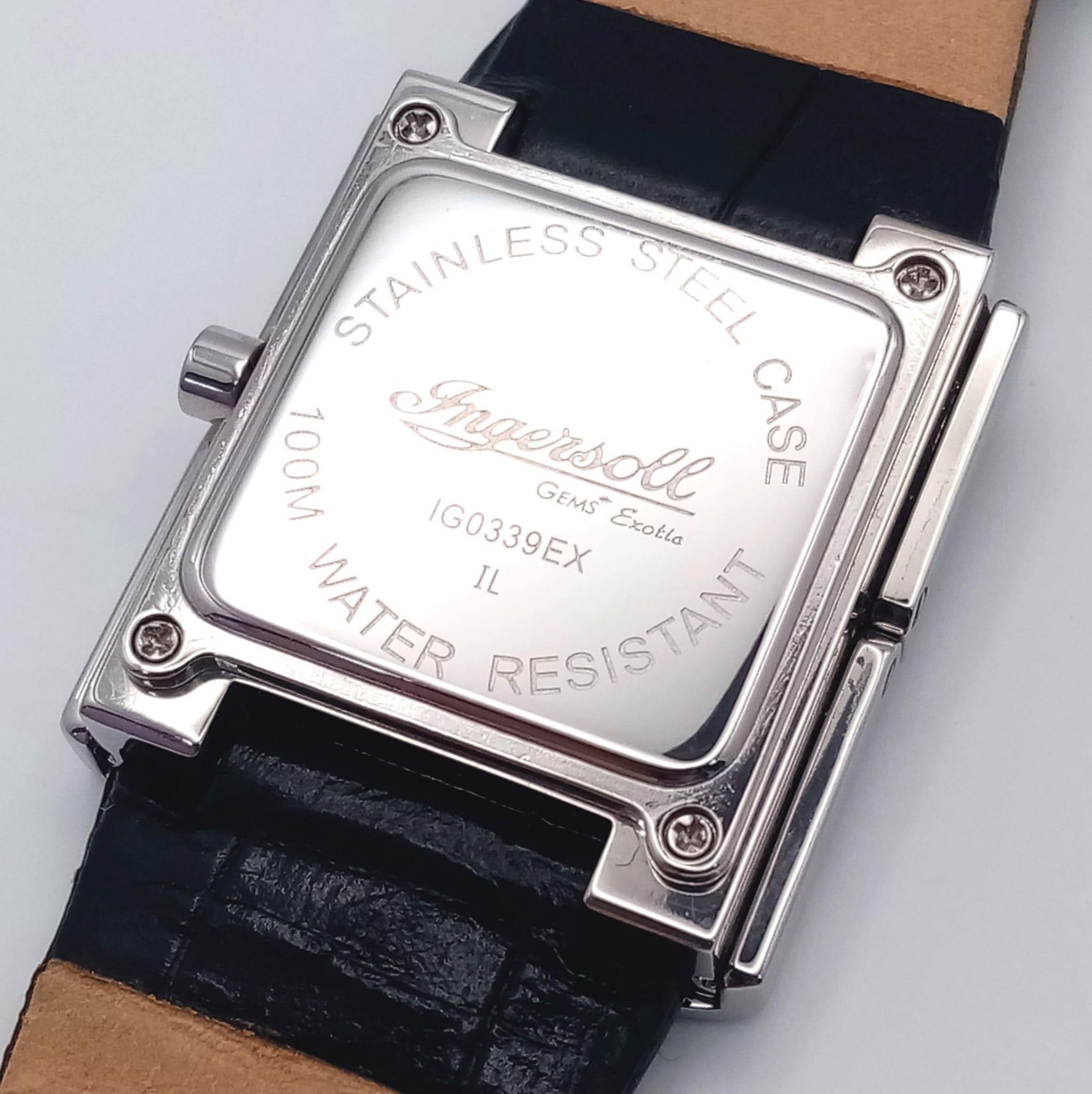 An Ingersoll Hidden Quartz Ladies Watch. Black leather strap. Rectangular hidden case - 27mm. Silver - Image 6 of 7