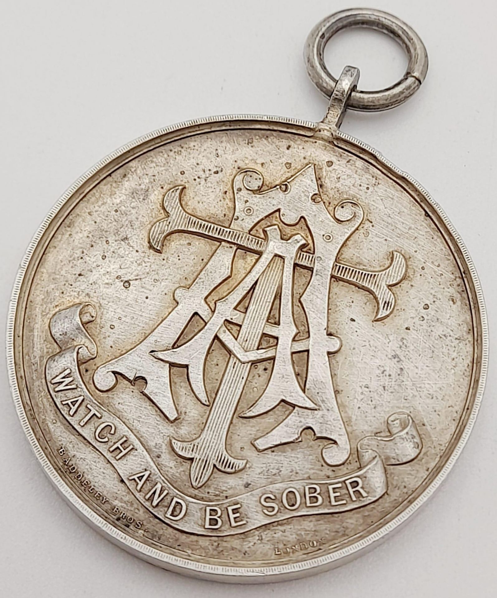 A Silver 1893 Dated Army Temperance Medal Issued by Badderley Bros. London. These medal were - Image 4 of 13