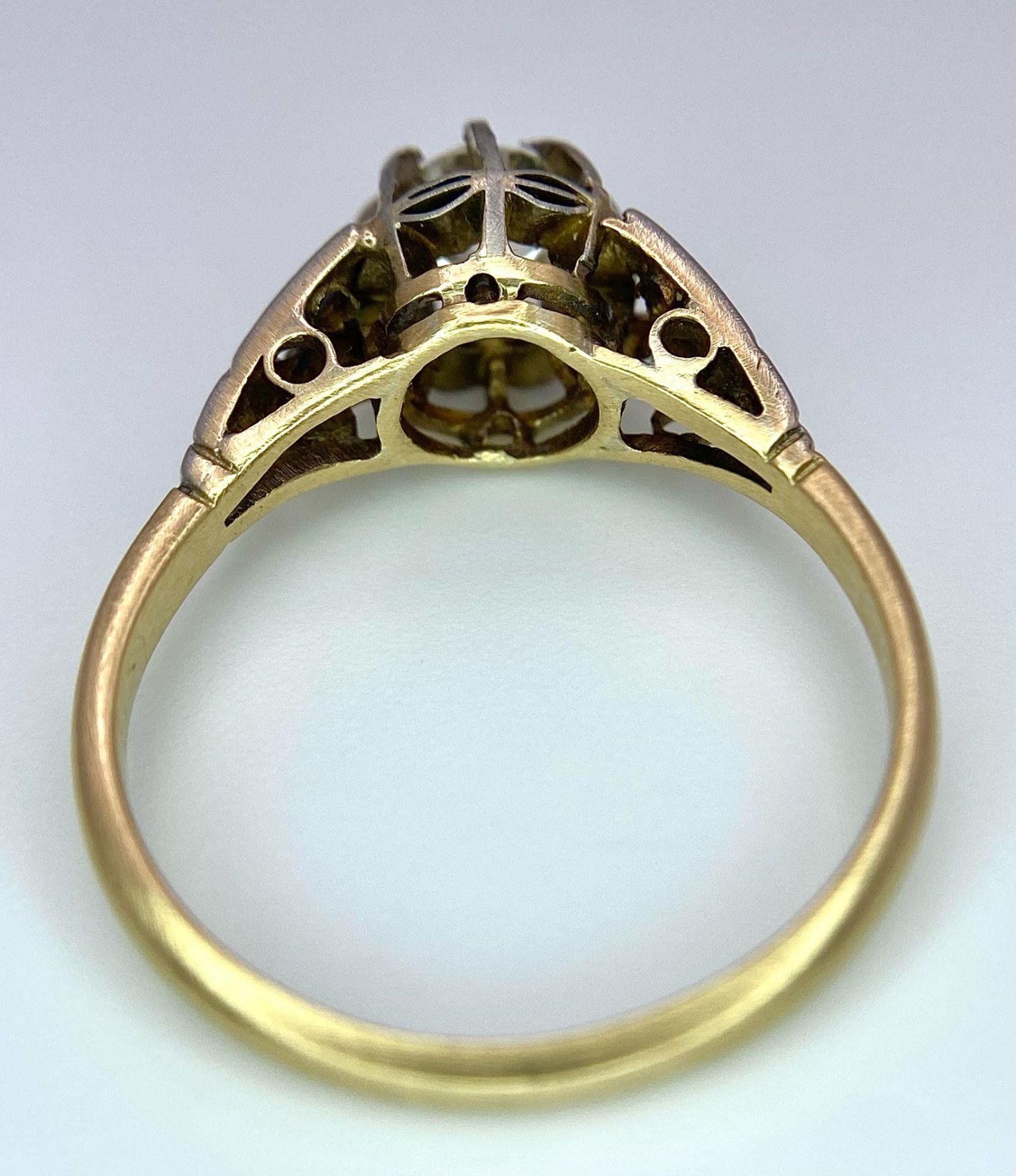 An Antique 18K Gold, Platinum and Diamond Ring. Central 0.75ct central stone with diamond accents on - Image 6 of 7
