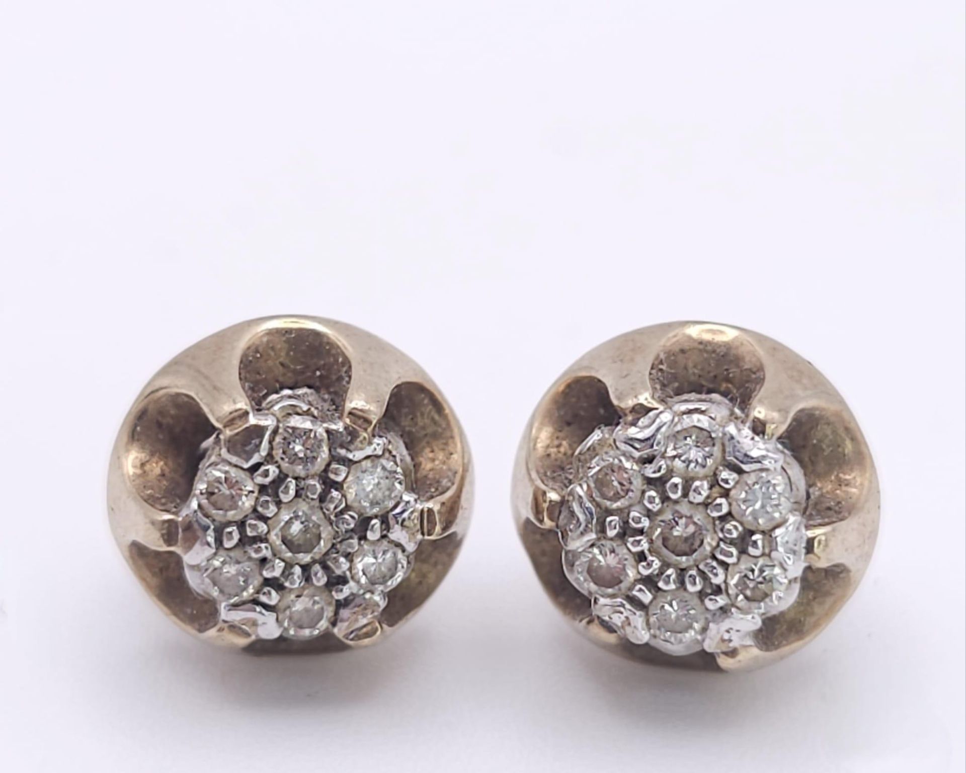 A Pair of Vintage 9K Yellow Gold and Diamond Stud Earrings. 3.3g total weight.