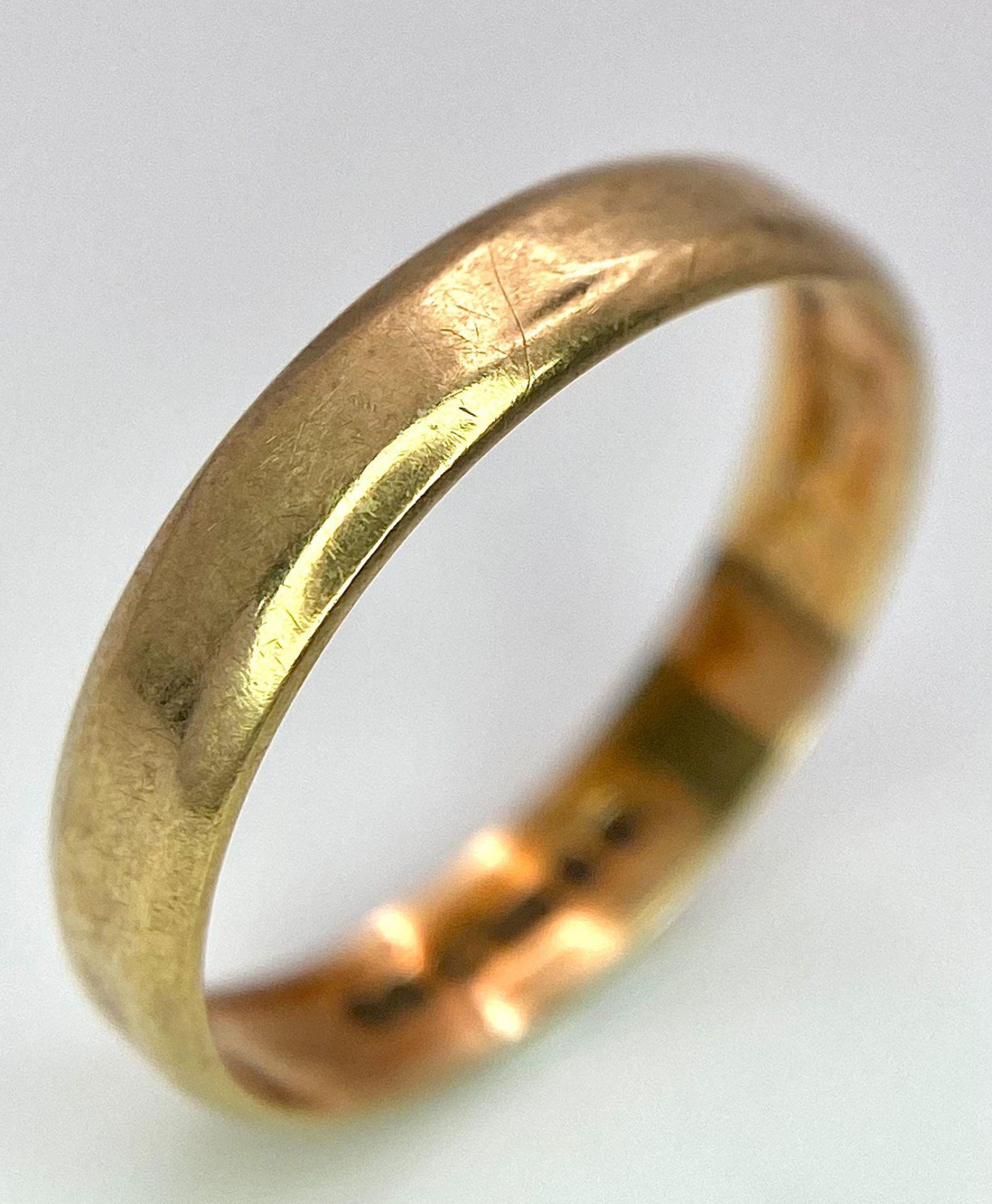 A 9 K yellow gold band ring, size: N, weight: 1.6 g