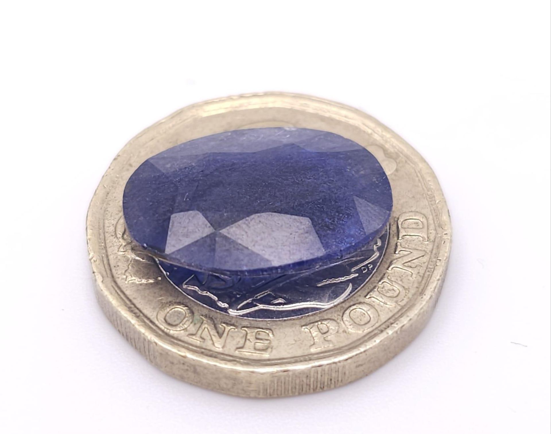 A 8.55ct African Vivid Blue Natural Sapphire, with Oval Faceted cut. Comes with the AIG America - Image 3 of 4