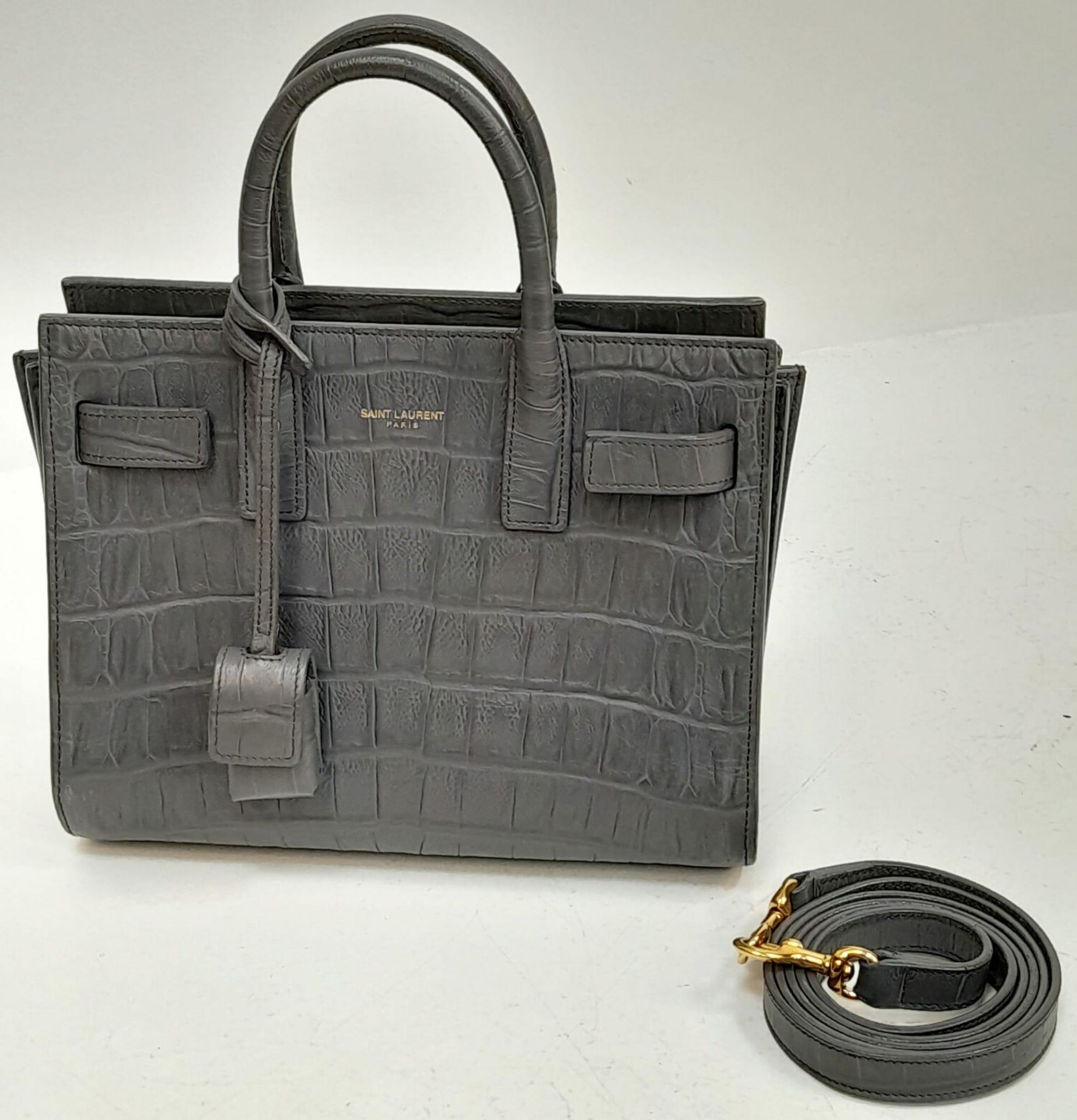 A Saint Laurent Grey Crocodile Embossed Small Sac De Jour Bag. Gold tone padlock (no key). Soft - Bild 3 aus 6