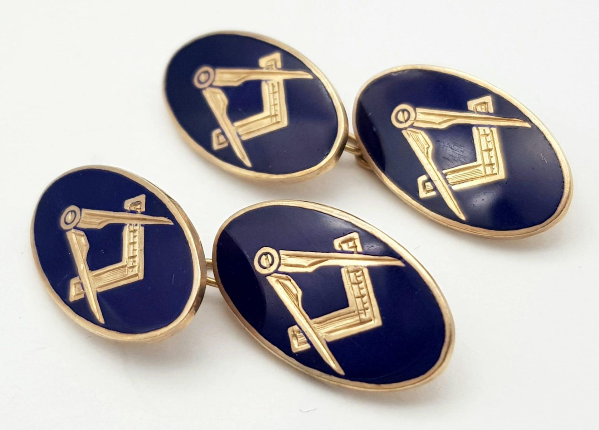 A Pair of Vintage 9K and Blue Enamel 'Masonic' Cufflinks. 9.5g total weight.
