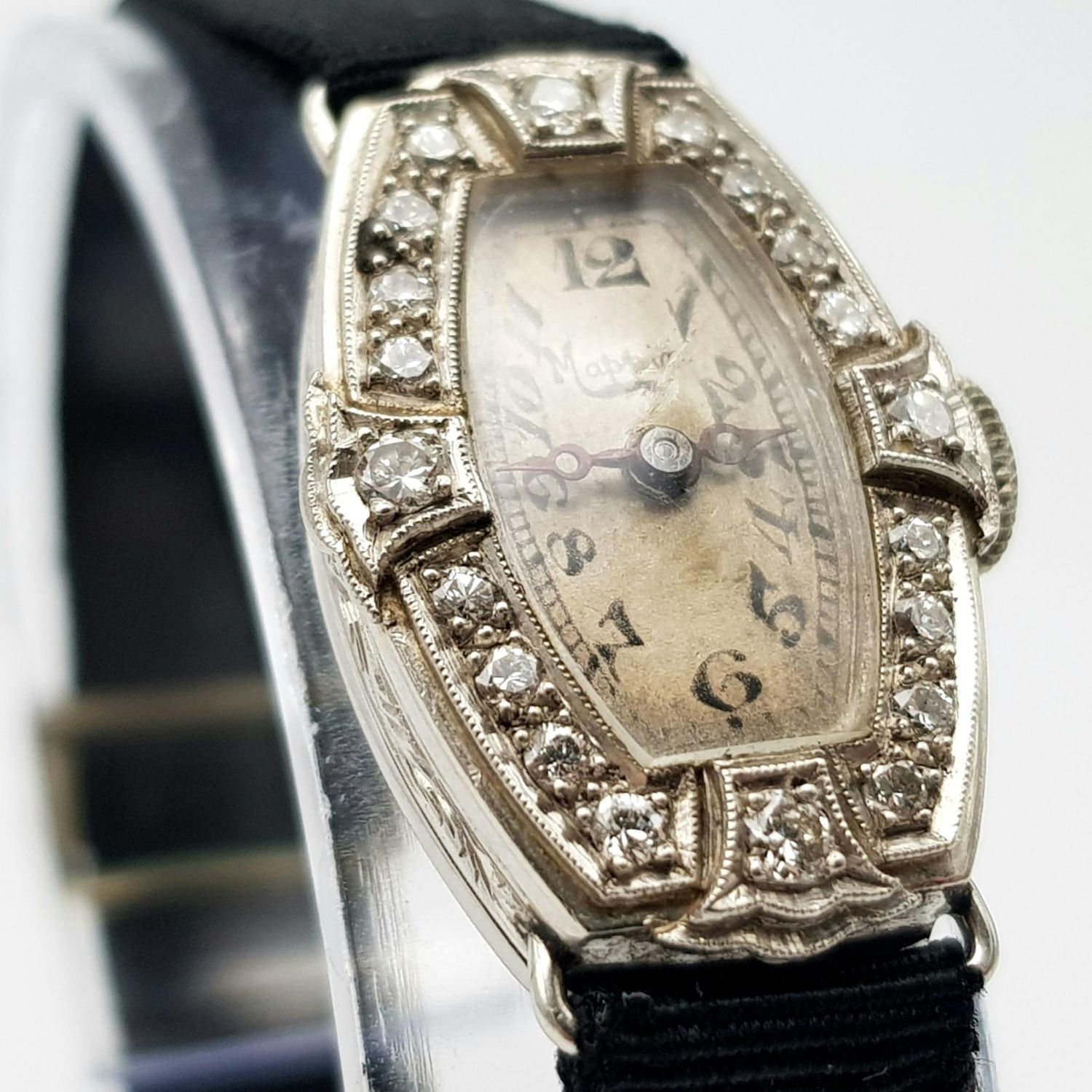 A 1920s Art Deco Mappin and Webb Platinum and Diamond Cocktail Ladies Watch. Original textile strap. - Image 7 of 8