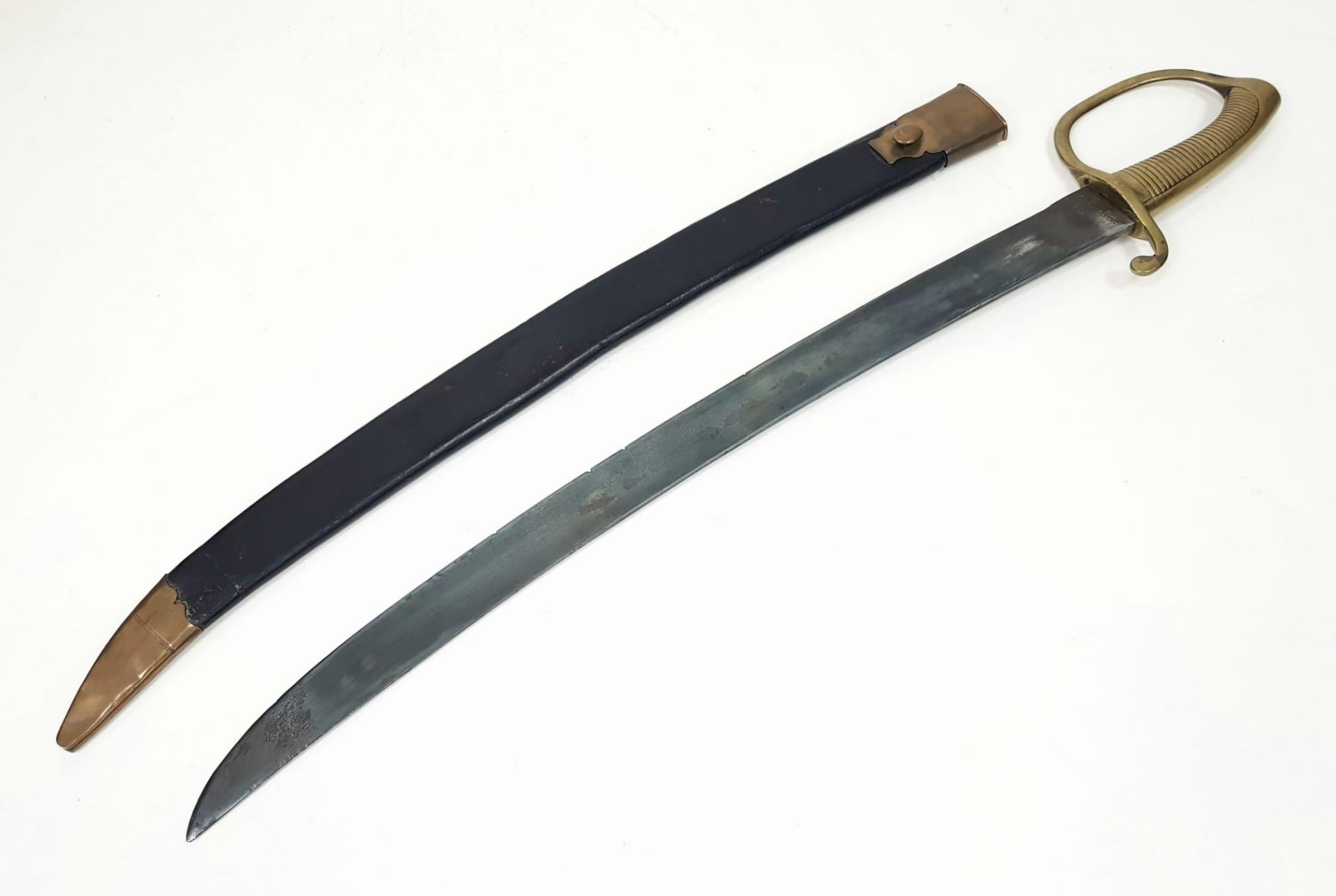 A Victorian Police Inspectors Short Sword in Original scabbard. Broad, curved blade and Brass