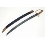 A Victorian Police Inspectors Short Sword in Original scabbard. Broad, curved blade and Brass