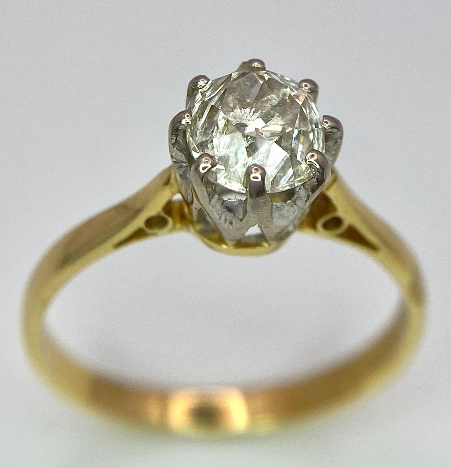 An 18K Yellow Gold Diamond Solitaire Ring. 1ct brilliant round cut diamond. Size N. 2.57g total