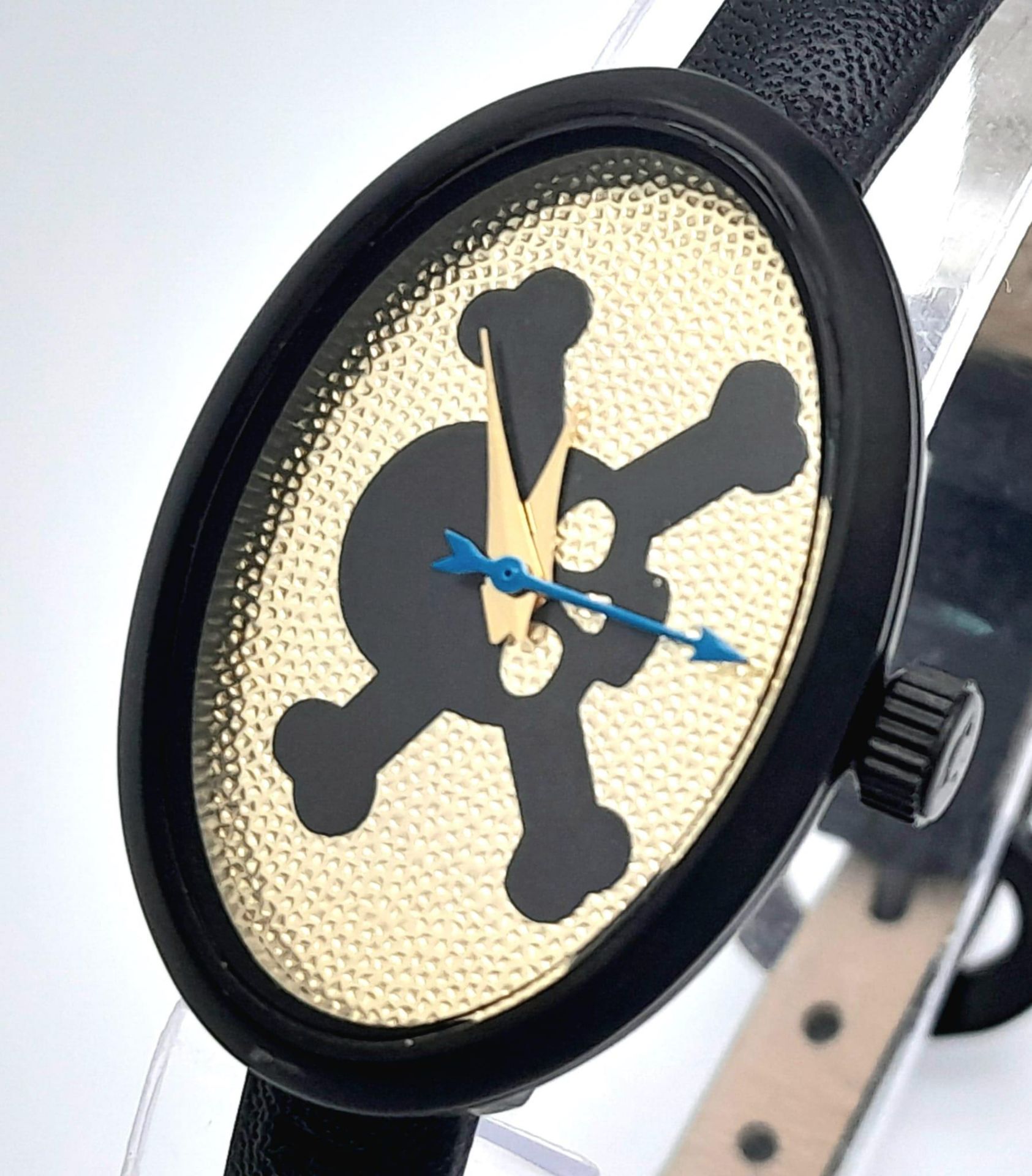 A Vivienne Westwood Skull and Crossbone Watch. Oval case - 22mm. In working order. - Image 3 of 8