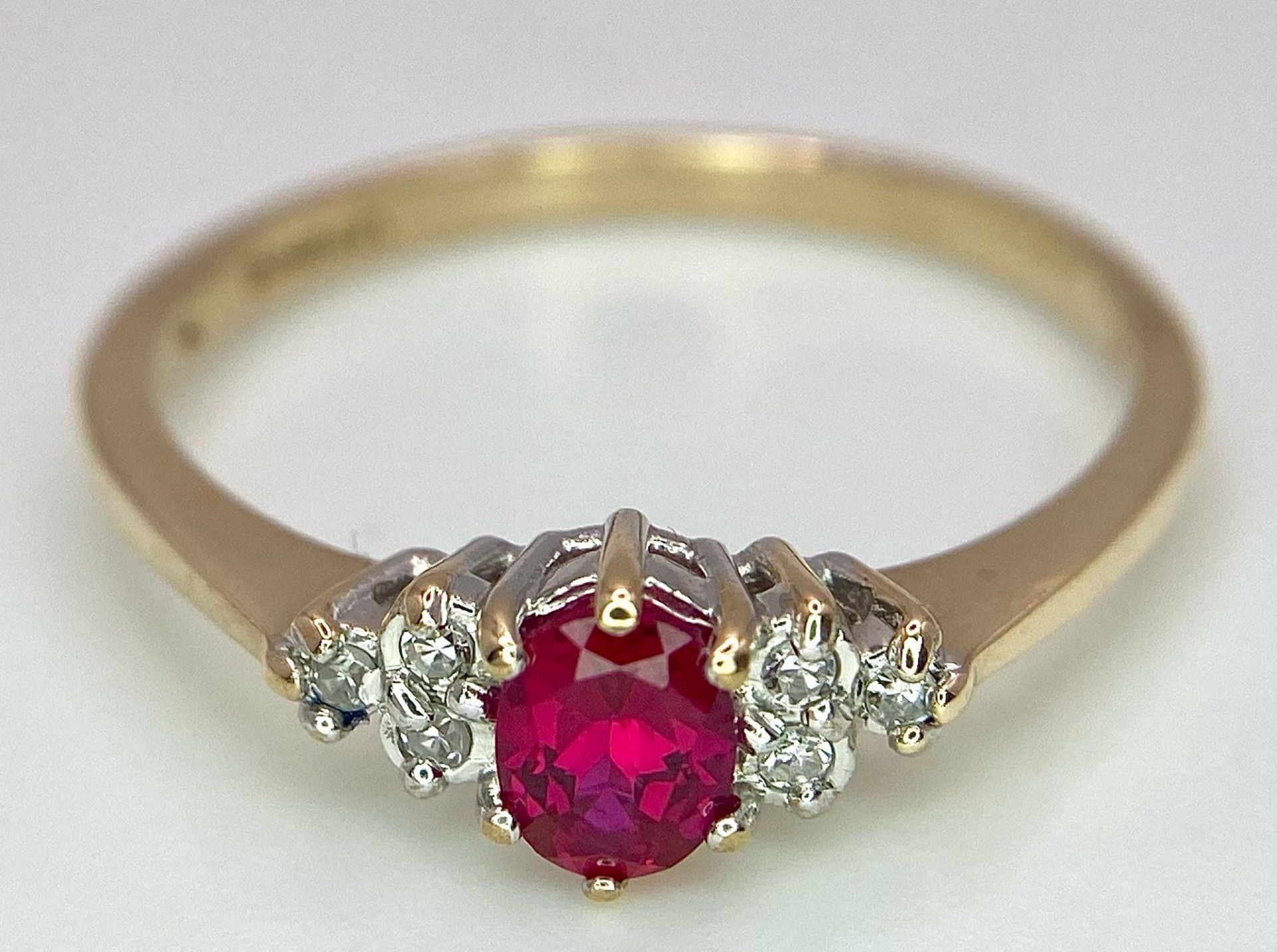 A 9K Yellow Gold Diamond & Red Stone (probably ruby) Ring. Size S, 2g total weight. Ref: 8418 - Image 4 of 7