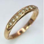 A 14k Yellow Gold Diamond Half Eternity Ring. Size N. 2.1g total weight.