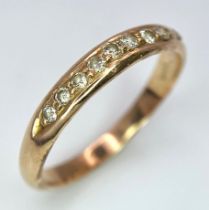 A 14k Yellow Gold Diamond Half Eternity Ring. Size N. 2.1g total weight.