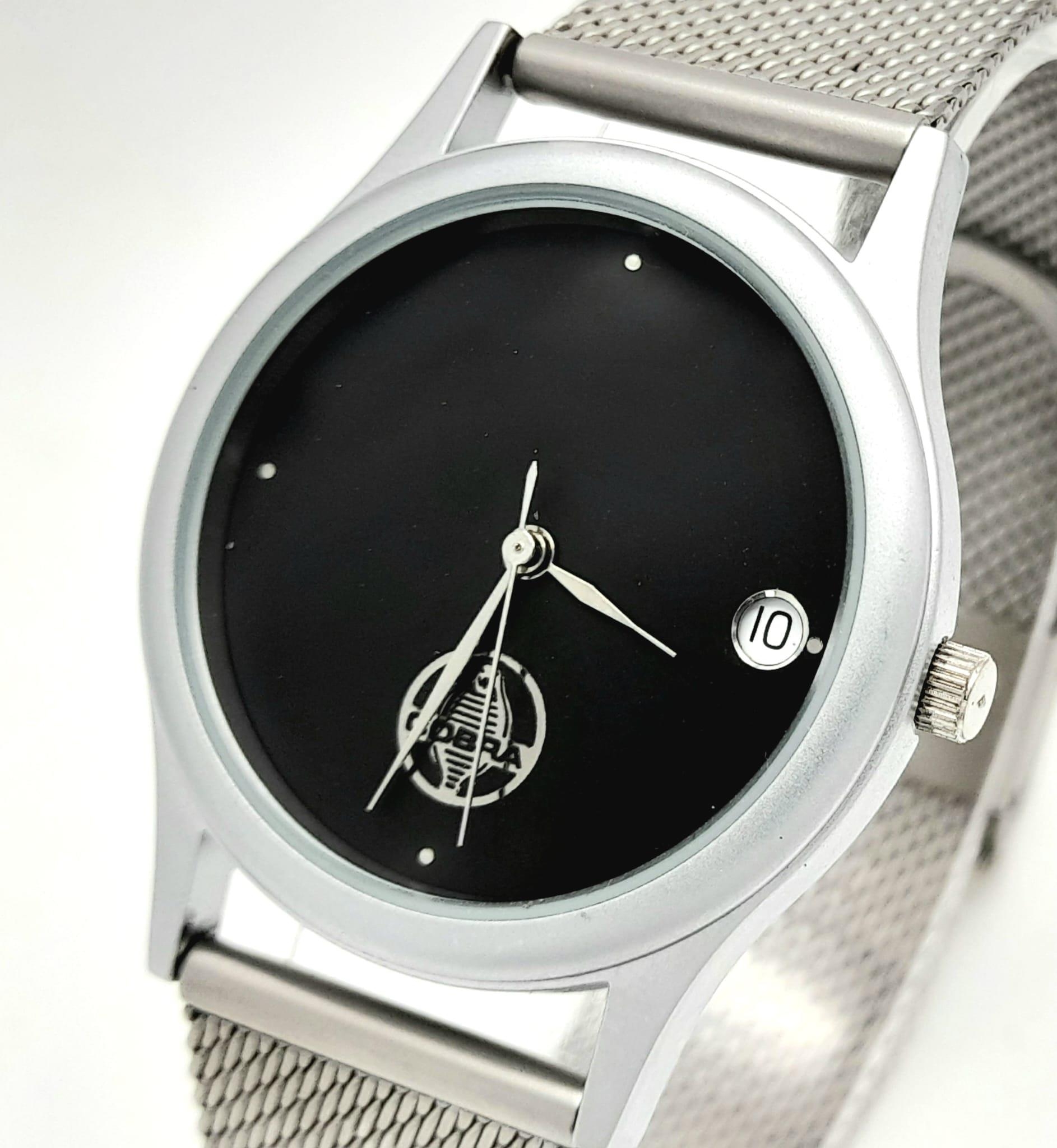 A MODERN "COBRA" BY CITY WATCH INTERNATIONAL , QUARTZ MOVEMENT ON A STAINLESS STEEL STRAP . 34mm - Image 2 of 12