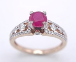 A 14K YELLOW GOLD DIAMOND & RUBY RING. 0.40CT. 3.6G. SIZE N.