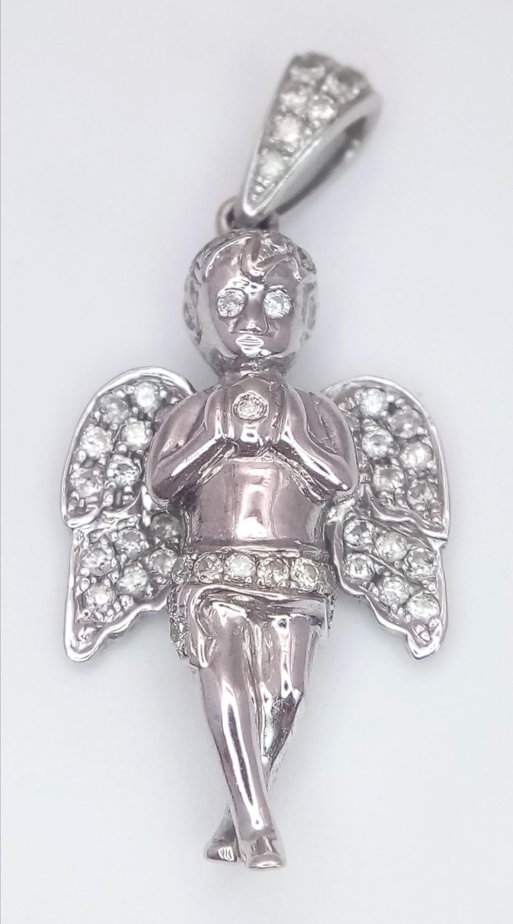 A 9K White Gold Diamond Set Angel Pendant. 0.30ctw, 3.5cm length, 4g total weight. Ref: SC 7066 - Image 2 of 4