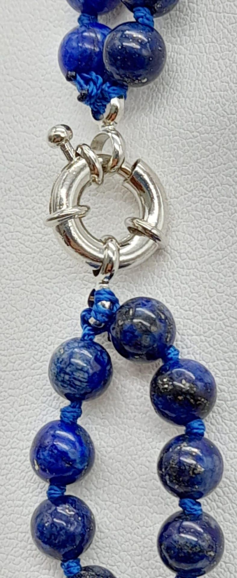 A Classic Lapis Lazuli Double Row Graduated Bead Necklace. 40-44cm length. Largest lapis bead - - Image 6 of 9