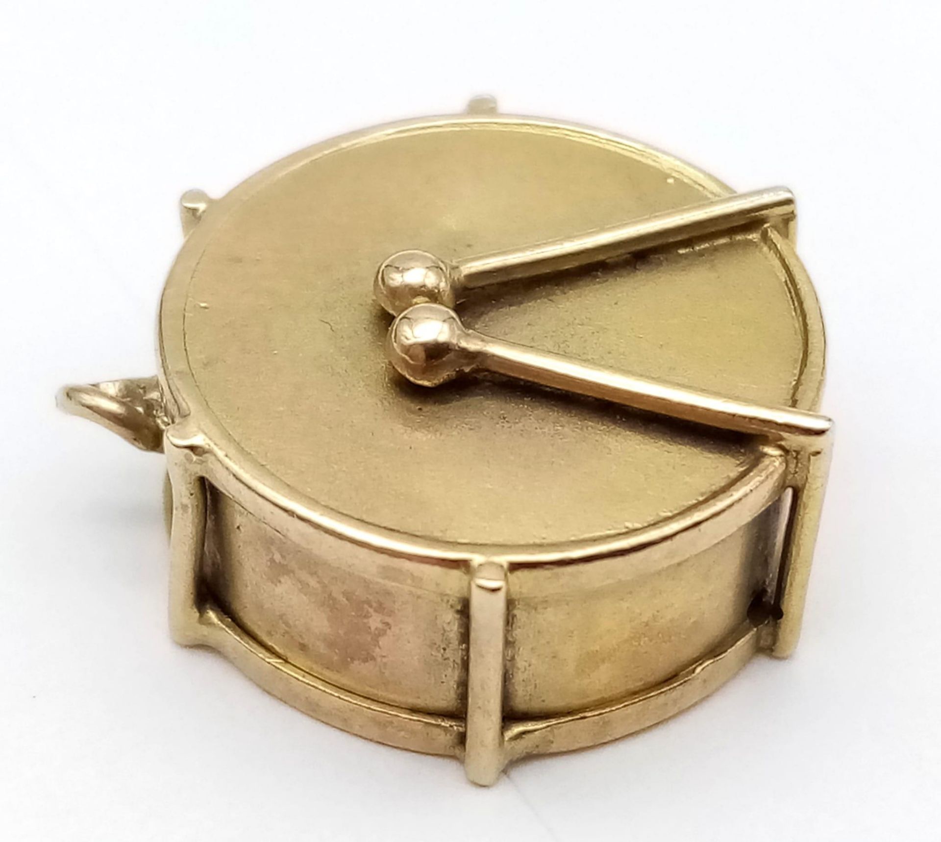 A 9K Yellow Gold Marching Band Drum Charm/Pendant. 2.25g