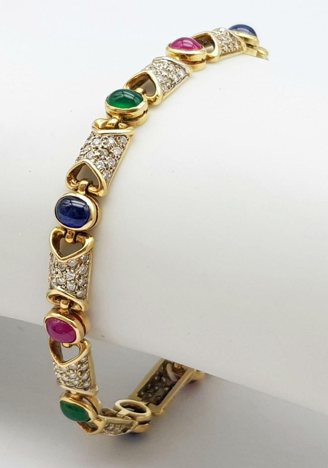 A GORGEOUS 18K YELLOW GOLD DIAMOND, SAPPHIRE, RUBY & EMERALD SET BRACELET. 1.50CTW OF ENCRUSTED - Image 2 of 6