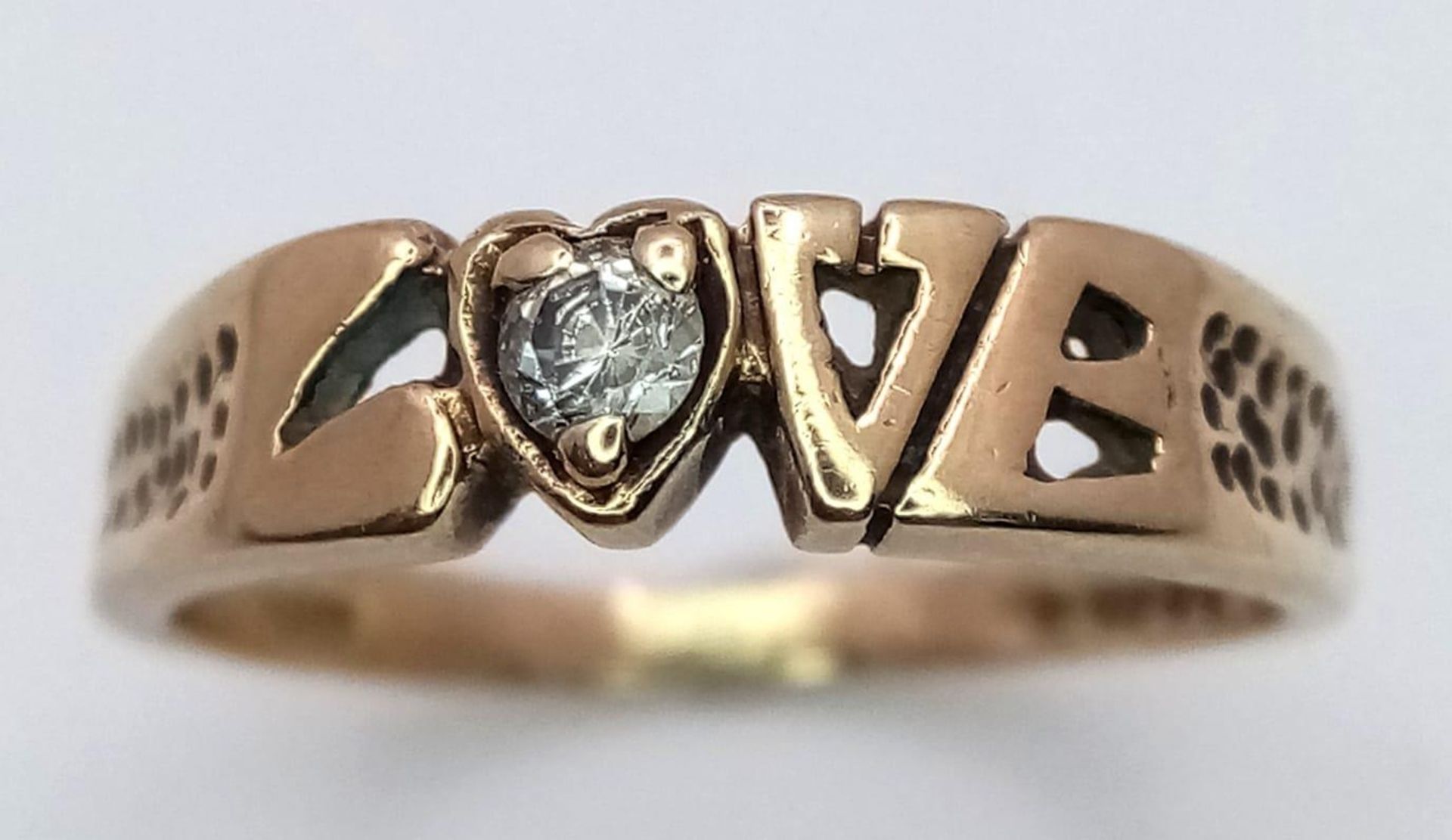 A 9K Yellow Gold 'Love' Ring with White Stone Decoration. Size O/P. 2.52g weight. - Bild 2 aus 5