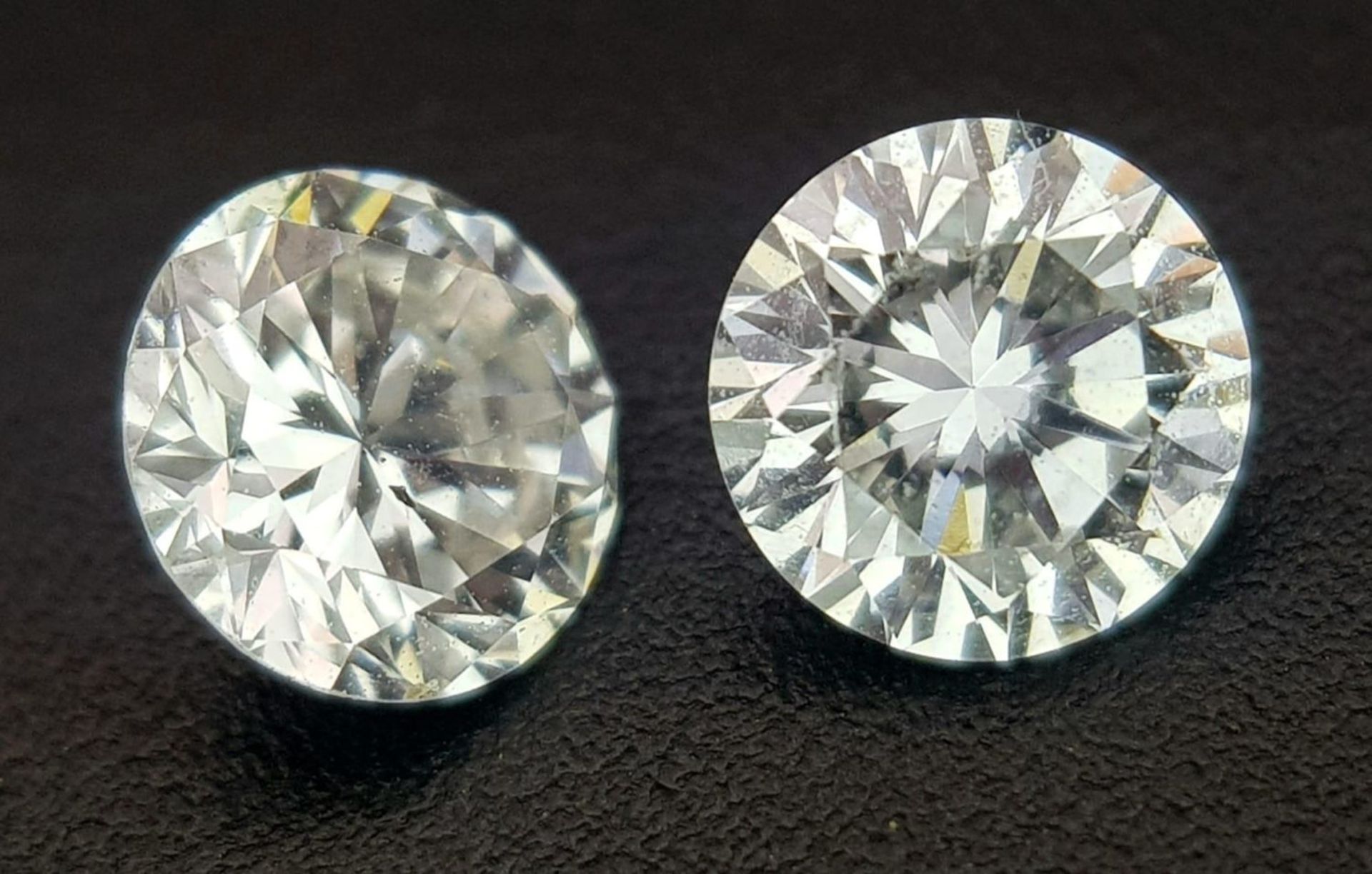 A top quality pair of brilliant cut diamonds, 0.402 carats each, with certificates from - Bild 3 aus 12