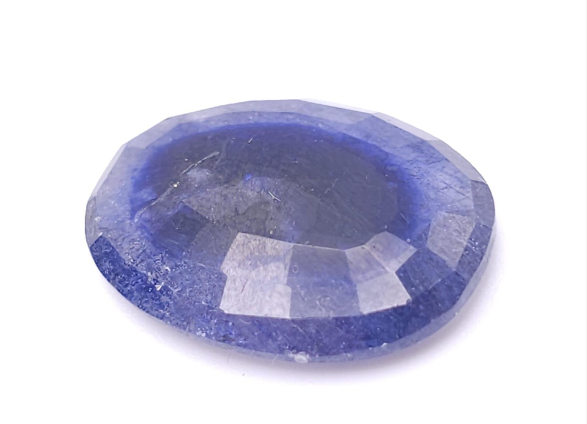 A 8.55ct African Vivid Blue Natural Sapphire, with Oval Faceted cut. Comes with the AIG America - Image 2 of 4