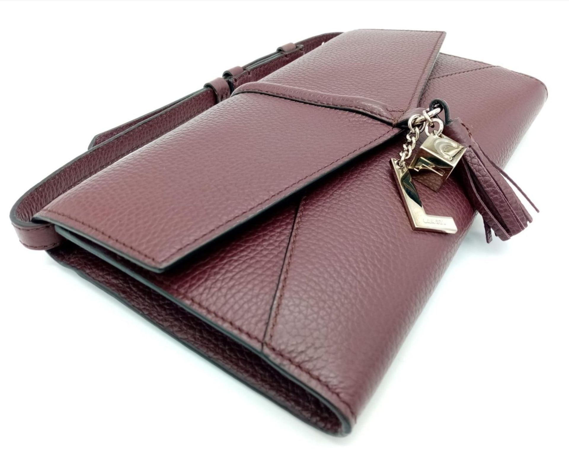 A Lance Burgundy Leather Hand/Shoulder Flap Bag. Textured leather exterior. Soft red textile - Image 9 of 16