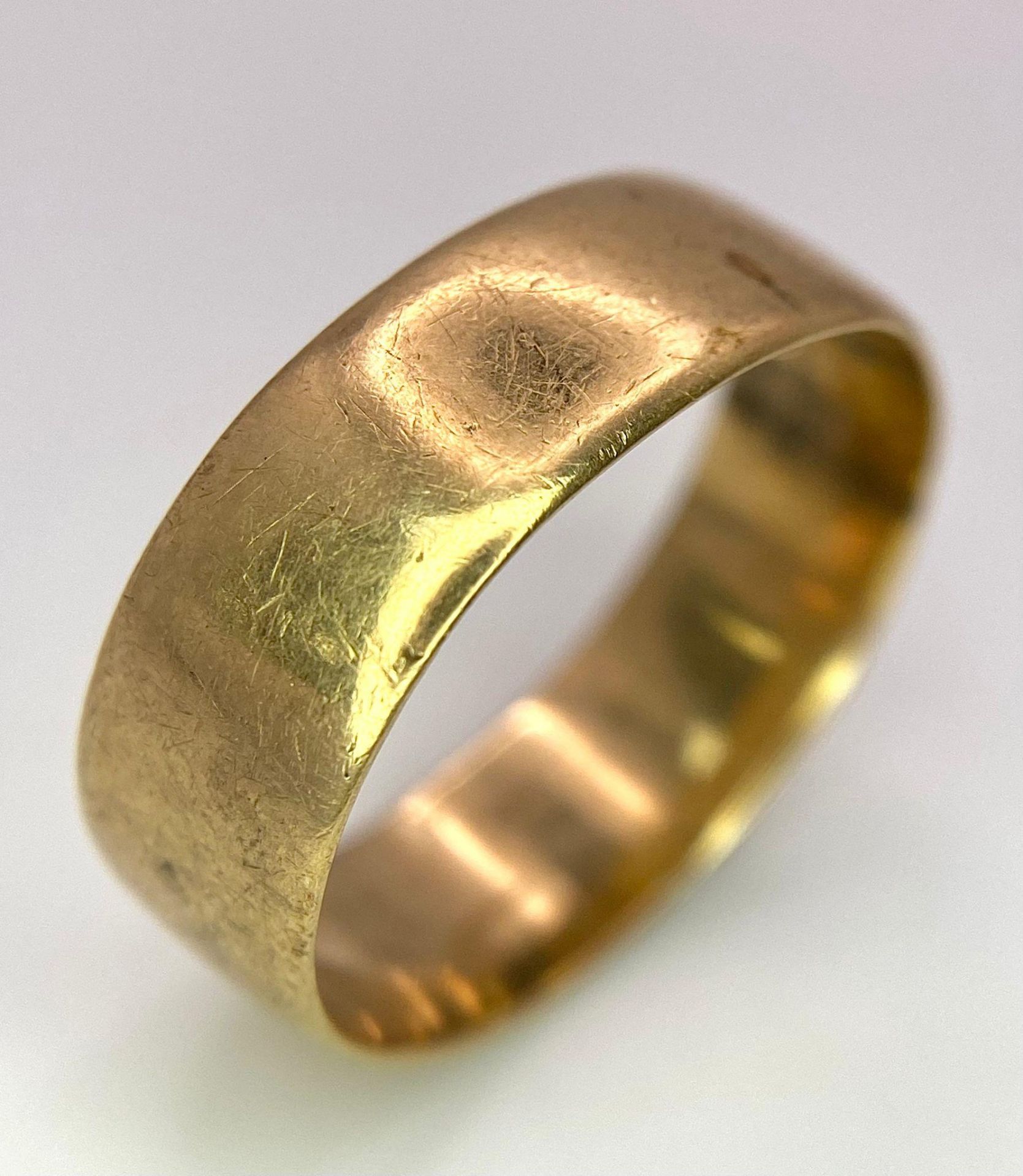 A Vintage 9K Band Ring. Size U. 4.33g weight. 7mm width.