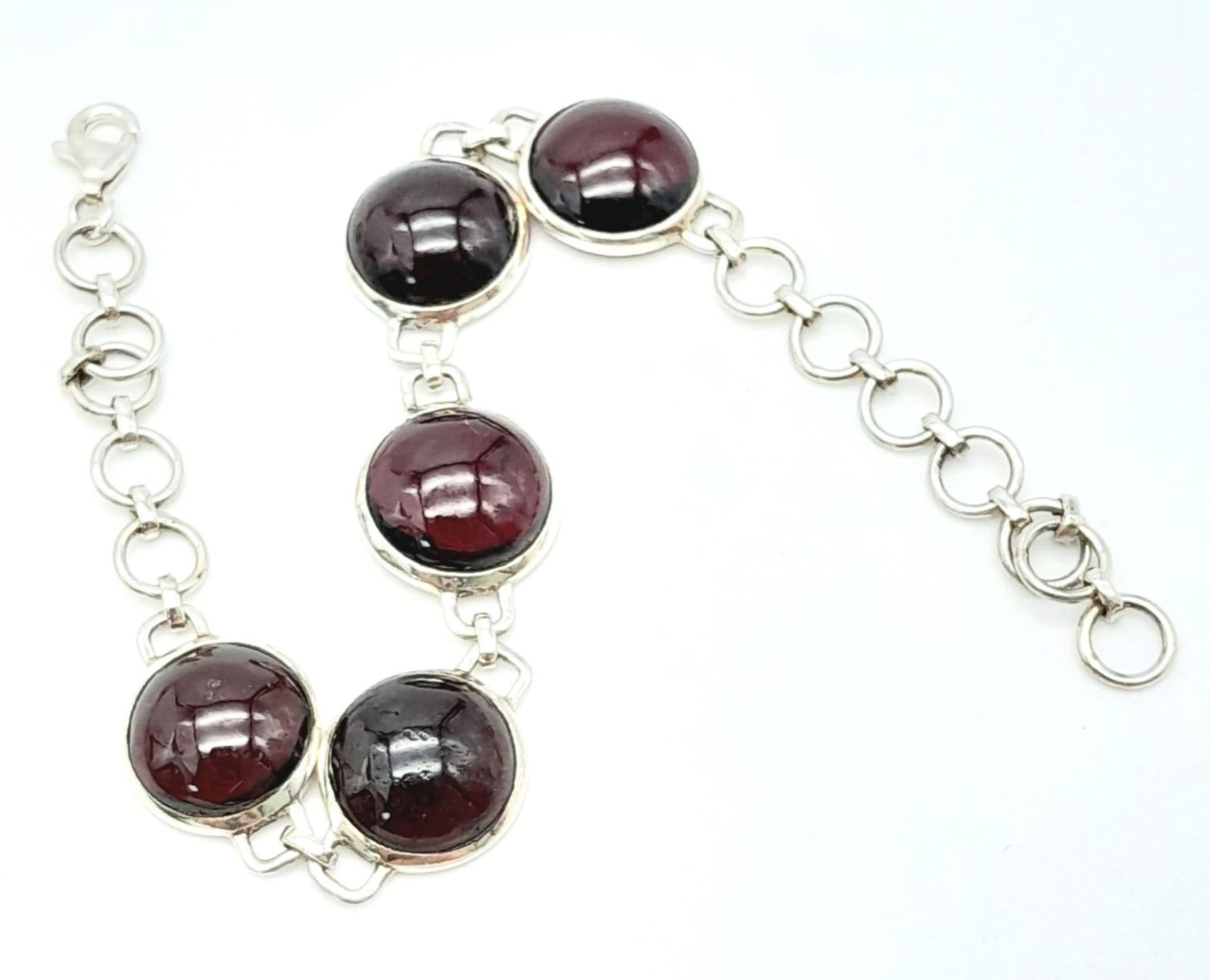 A Sterling Silver Red Stone Cabochon Set Bracelet. 19cm Length. 1.3cm Width. Gross Weight 12.75 - Image 5 of 10