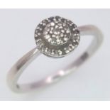 A vintage 9 K white gold ring with a diamond cluster, size: ), weight: 2 g.