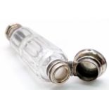 An Antique Victorian Double Ended Glass Scent Bottle. A screw top and hinged white metal lid at