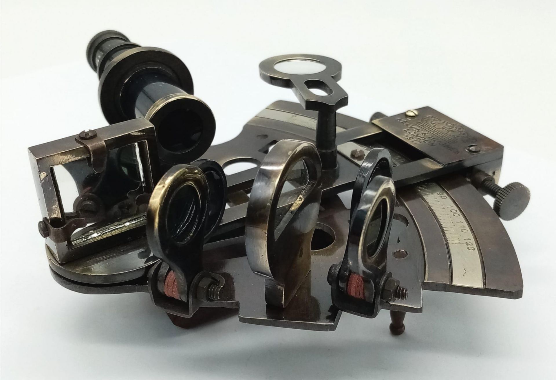 A very ornamental, brass sextant, with many moving parts and an inscription KELVIN & HUGHES LONDON - Image 2 of 5