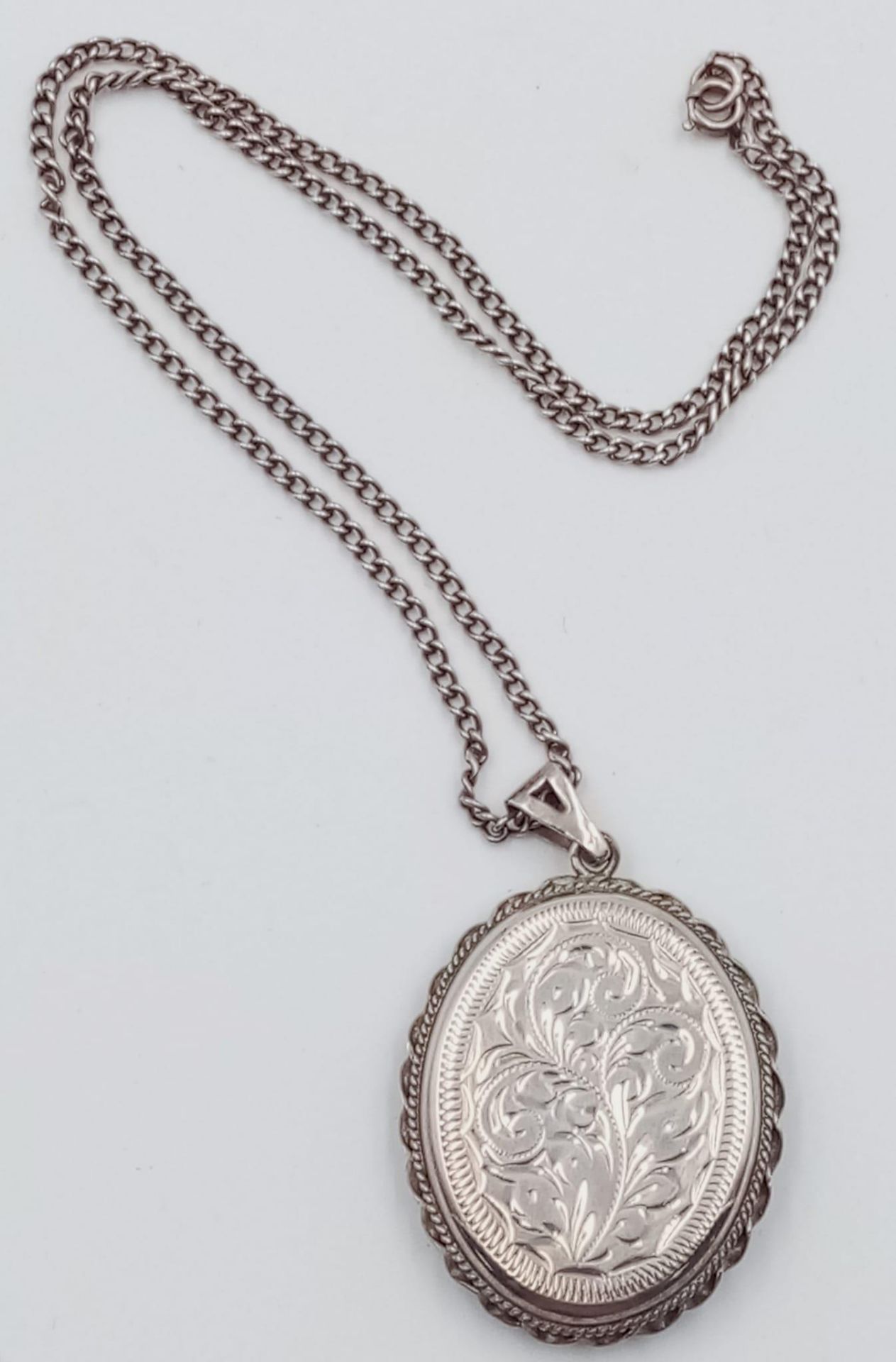 A vintage sterling silver floral motif locket pendant on silver chain. Full Birmingham hallmarks, - Image 3 of 6