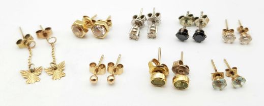 Eight pairs of 9 K yellow gold stud earring with diamonds, sapphires, peridot, aquamarine, etc.