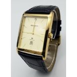 A Sekonda Diamond Gents Quartz Watch. Black leather strap. Gilded rectangular case - 32mm. Gold tone