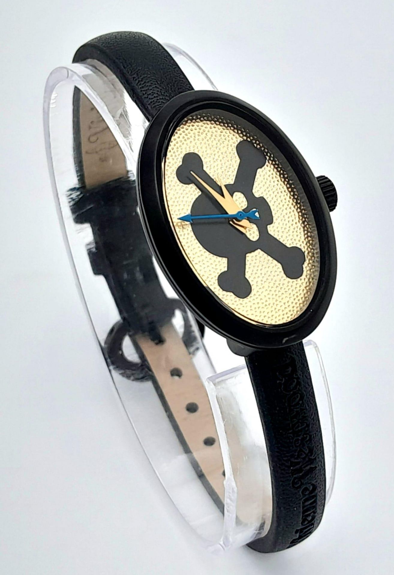 A Vivienne Westwood Skull and Crossbone Watch. Oval case - 22mm. In working order. - Image 4 of 8