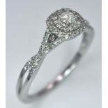 A 9K White Gold Diamond Double Halo Ring. 0.30ctw, size P, 2.2g total weight. Ref: 8447