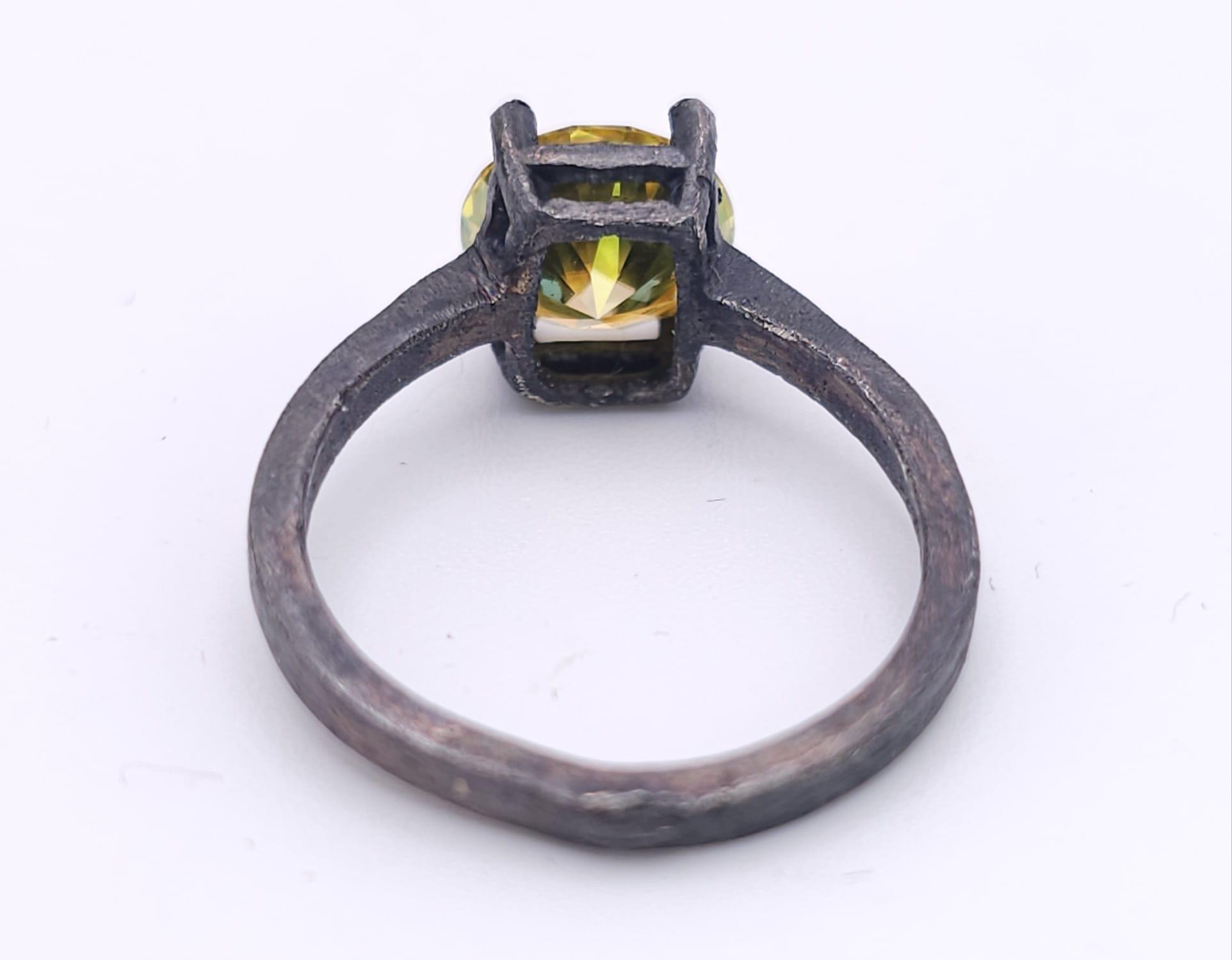 A sterling silver, with a black patina, solitaire ring with a round cut, yellow moissanite (2 - Image 6 of 13