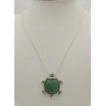 A Green Jade Turtle Pendant on a 925 Silver Necklace. 4cm pendant. 44cm necklace.