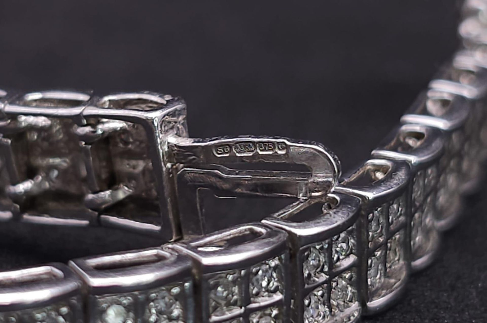 A 9K White Gold Diamond Set Bracelet, with Under Safety Catch Fitting. 1ctw, 19cm length, 12.7g - Image 13 of 14