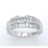 AN 18K WHITE GOLD DIAMOND SET BAND RING - 3 ROWS OF 1CTW OF DIAMOND MIXTURE OF PRINCESS AND BAGUETTE