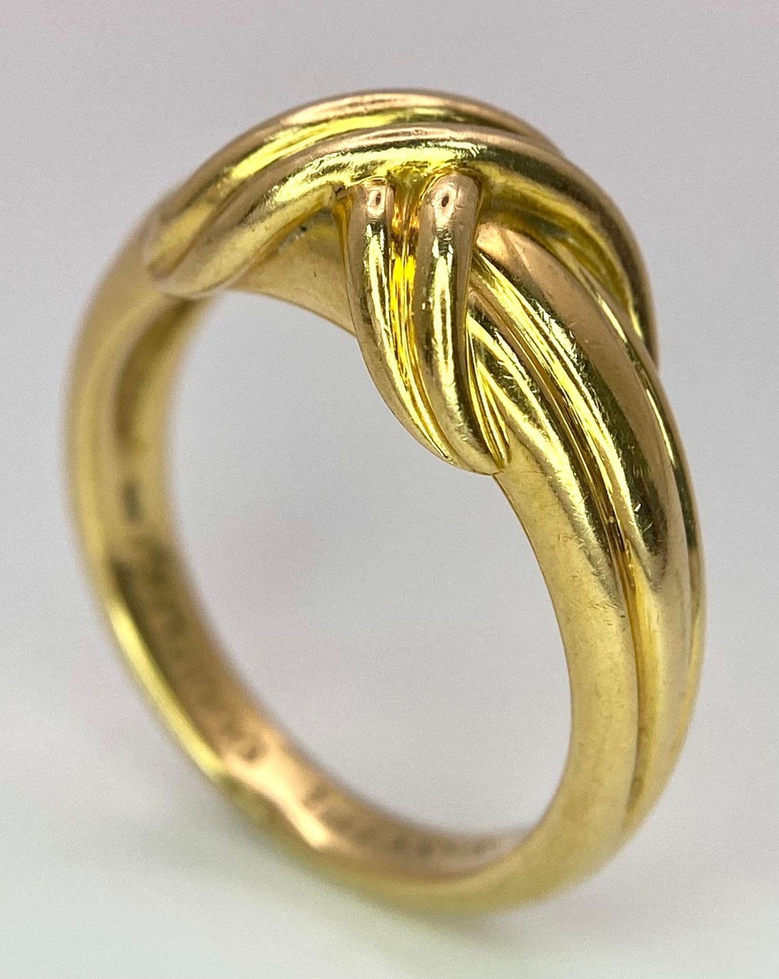 A Beautiful Tiffany and Co. 18K Gold Love Ring. Tiffany and co. markings. Size N. 7.2g weight. - Image 4 of 10