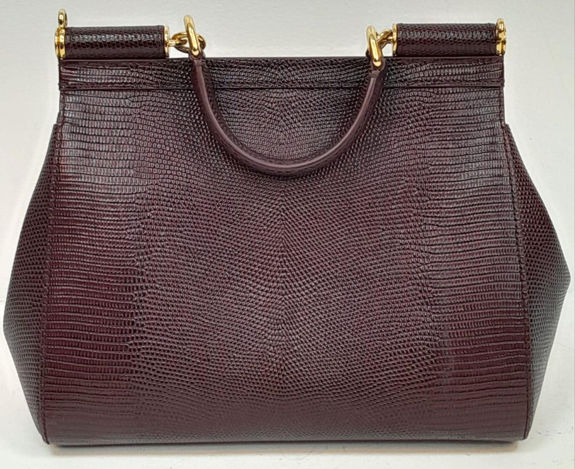 A Dolce & Gabbana Burgundy Miss Sicily Bag. Reptile embossed leather exterior with gold-toned - Image 3 of 6