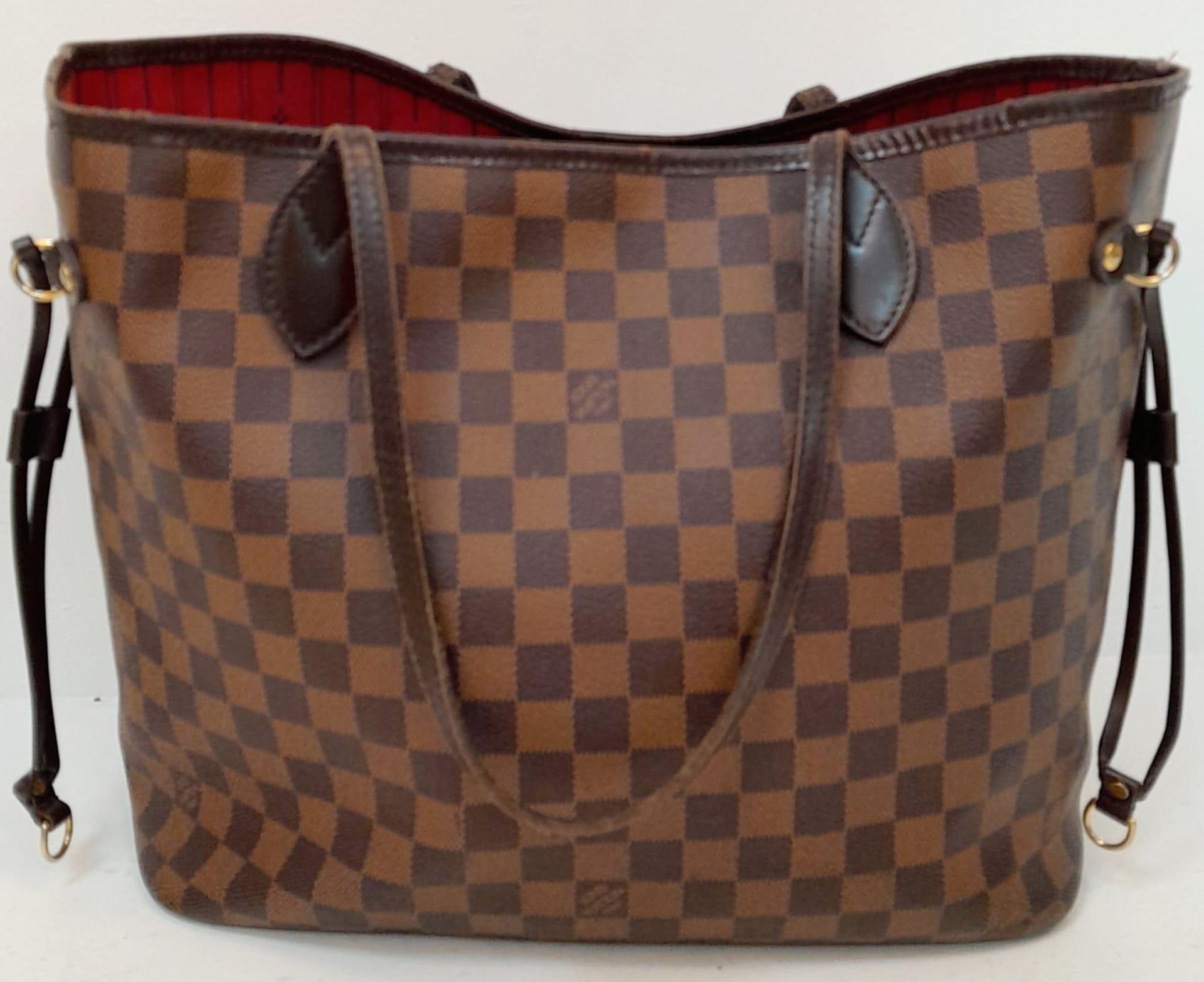 A Louis Vuitton "Neverfull" Damier Ebene Bag. Size MM. Leather Exterior Coated Canvas with gold- - Bild 2 aus 6